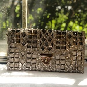 Silver clutch bag.